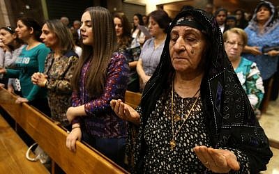 Iraqi Christians attend a mass at the Church of Our Lady of Perpetual Help in Erbil, the capital of the autonomous Kurdish region of northern Iraq, on October 25, 2016. (AFP/Safin Hamed) Iraqi Christians attend a mass at the Church of Our Lady of Perpetual Help in Erbil, the capital of the autonomous Kurdish region of northern Iraq, on October 25, 2016. (AFP/Safin Hamed)