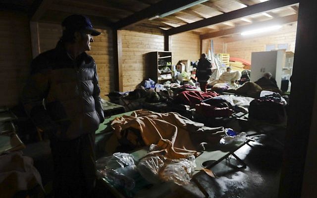Residents prepare to spend the night in makeshift shelters after a 5.9 earthquake destroyed part of their neighborhood in the town of Visso, central Italy, October 27, 2016. (AP/Alessandra Tarantino) 