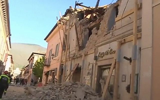 In this image made from video, firefighters stand in front of a damaged building in Norcia, Italy, Sunday, Oct. 30, 2016 after a powerful earthquake with a magnitude of 6.6 rocked central and southern Italy. (Sky Italia via AP) In this image made from video, firefighters stand in front of a damaged building in Norcia, Italy, Sunday, Oct. 30, 2016 after a powerful earthquake with a magnitude of 6.6 rocked central and southern Italy. (Sky Italia via AP)