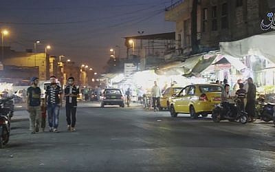 A street scene from a video published by the Islamic State group showing a street in Mosul, Iraq, October 17, 2016. (Militant video, Amaq News Agency via AP)