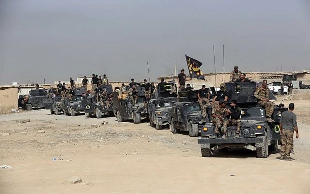 In this Saturday, Oct. 15, 2016 file photo, Iraq's elite counterterrorism forces gather ahead of an operation to re-take the Islamic State-held City of Mosul, outside Irbil, Iraq. (AP Photo/Khalid Mohammed, File) In this Saturday, Oct. 15, 2016 file photo, Iraq's elite counterterrorism forces gather ahead of an operation to re-take the Islamic State-held City of Mosul, outside Irbil, Iraq. (AP Photo/Khalid Mohammed, File)