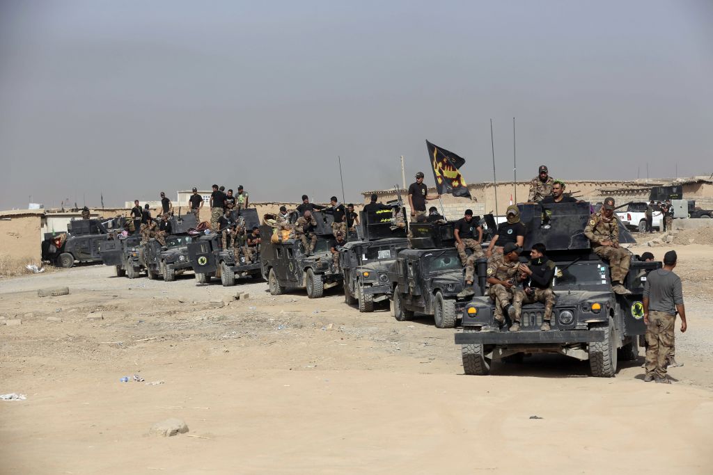 In this Saturday, Oct. 15, 2016 file photo, Iraq's elite counterterrorism forces gather ahead of an operation to re-take the Islamic State-held City of Mosul, outside Irbil, Iraq. (AP Photo/Khalid Mohammed, File) In this Saturday, Oct. 15, 2016 file photo, Iraq's elite counterterrorism forces gather ahead of an operation to re-take the Islamic State-held City of Mosul, outside Irbil, Iraq. (AP Photo/Khalid Mohammed, File)