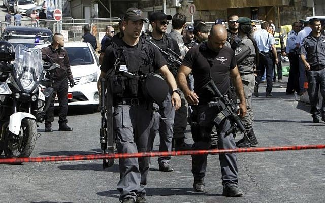 Israeli police secure the scene where a car driven by a Palestinian terrorist was intercepted by the police and the gunman shot dead in Jerusalem Sunday, Oct. 9, 2016. (AP Photo/Mahmoud Illean) Israeli police secure the scene where a car driven by a Palestinian terrorist was intercepted by the police and the gunman shot dead in Jerusalem Sunday, Oct. 9, 2016. (AP Photo/Mahmoud Illean)