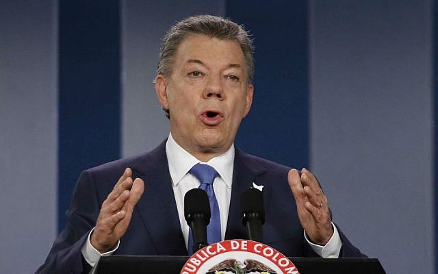 In this Wednesday, Oct. 4, 2016 file photo Colombia’s President Juan Manuel Santos delivers a statement to the press after meeting with former President Alvaro Uribe and other opposition leaders at the presidential palace in Bogota, Colombia. (AP Photo/Fernando Vergara, File) In this Wednesday, Oct. 4, 2016 file photo Colombia’s President Juan Manuel Santos delivers a statement to the press after meeting with former President Alvaro Uribe and other opposition leaders at the presidential palace in Bogota, Colombia. (AP Photo/Fernando Vergara, File)