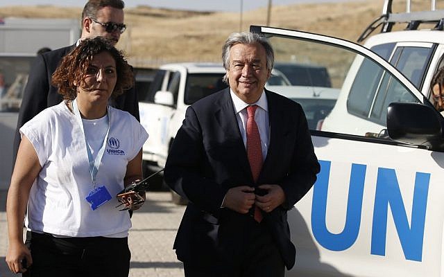 Antonio Guterres, at the time, UN High Commissioner for Refugees, right, arrives for a visit at the Midyat refugee camp in Mardin, southeastern Turkey, near the Syrian border, June 20, 2015. (AP/Emrah Gurel) 