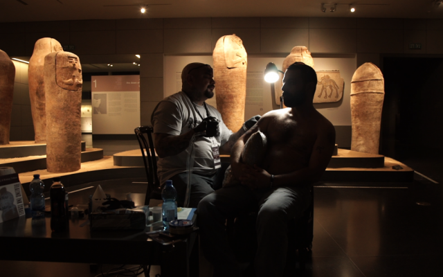 Israeli veteran Barak Miron, injured in Lebanon in 1999, is tattooed by world-famous tattoo artist Steve Soto at the Israel Museum, October 20, 2016. (Luke Tress/Times of Israel) Israeli veteran Barak Miron, injured in Lebanon in 1999, is tattooed by world-famous tattoo artist Steve Soto at the Israel Museum, October 20, 2016. (Luke Tress/Times of Israel)