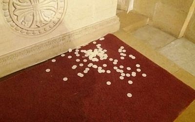 Eucharist bread scattered by vandals on the floor of the Basilica of the Transfiguration, October 25, 2016 (Courtesy)