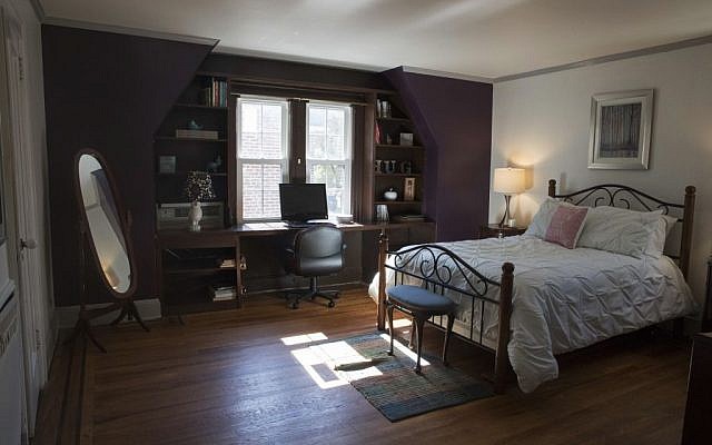 This Tuesday, Oct. 18, 2016 photo, shows a bedroom in the house where Republican presidential candidate Donald Trump spent his early childhood in the Jamaica Estates neighborhood of the Queens borough of New York. Trump’s first boyhood home in New York City is going on the auction block with an opening bid of $849,000. (AP Photo/Mary Altaffer)
