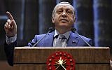 Turkish President Recep Tayyip Erdogan speaks during a meeting in Ankara, Turkey, Wednesday, Oct. 12, 2016. (Murat Cetinmuhurdar/ Presidential Press Service, Pool photo via AP)