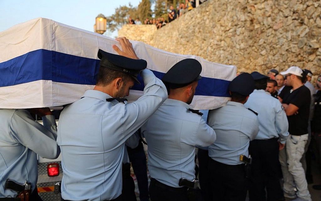 Police officers carry the coffin during the funeral on Jerusalem's Mount Herzl of police Sgt. Yosef Kirma who was killed in a terror attack earlier that day on October 9, 2016. (Israel Police)
