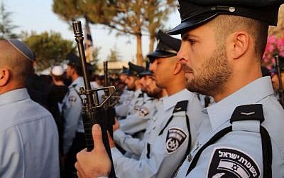 Police officers during the funeral on Jerusalem's Mount Herzl of police Sgt. Yosef Kirma who was killed in a terror attack earlier that day on October 9, 2016. (Israel Police) Police officers during the funeral on Jerusalem's Mount Herzl of police Sgt. Yosef Kirma who was killed in a terror attack earlier that day on October 9, 2016. (Israel Police)