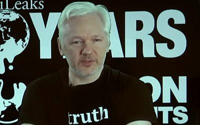 WikiLeaks founder Julian Assange addresses a press conference held by the organization in Berlin on October 4, 2016. Assange is holed up in the Ecuadorean embassy in London, to evade an extradition request by Sweden over rape allegations. (screen capture: YouTube)