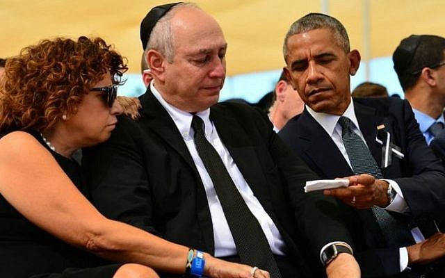 US President Barack Obama hands a tissue to a weeping Chemi Peres, at the funeral of his father, former President Shimon Peres, September 30, 2016. (Kobi Gideon/GPO) US President Barack Obama hands a tissue to a weeping Chemi Peres, at the funeral of his father, former President Shimon Peres, September 30, 2016. (Kobi Gideon/GPO)