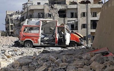 A destroyed ambulance is seen in the rebel-held part of eastern Aleppo, Syria. September 23, 2016. (Syrian Civil Defense White Helmets via Associated Press)