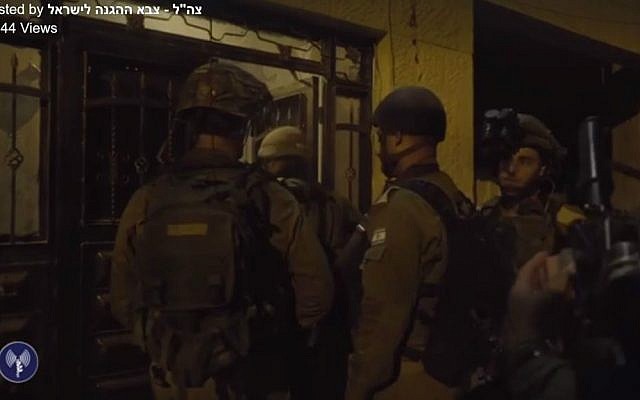 IDF troops at the home of a Hamas terrorist who led the October 2015 shooting attack that killed Eitam and Na'ama Henkin, on October 11, 2016. (IDF/Facebook screen capture) IDF troops at the home of a Hamas terrorist who led the October 2015 shooting attack that killed Eitam and Na'ama Henkin, on October 11, 2016. (IDF/Facebook screen capture)