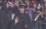 Members of Japanese girl band Keyakizaka46 wearing military-style costumes that were compared to Nazi uniforms. (screen capture: YouTube)