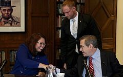 Rep. Tammy Duckworth and Sen. Mark Kirk shake hands after their debate on Monday Oct. 3, 3016 in the Chicago Tribune Editorial Board room. (Nancy Stone/Chicago Tribune/TNS via Getty Images via JTA)