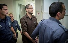 Said Komboz arrives to the Jerusalem District court on October 26, 2016. Komboz was sentenced to 17 years in prison after he stabbed an Israeli soldier near the central bus station in Jerusalem last year. (Yonatan Sindel/Flash90)