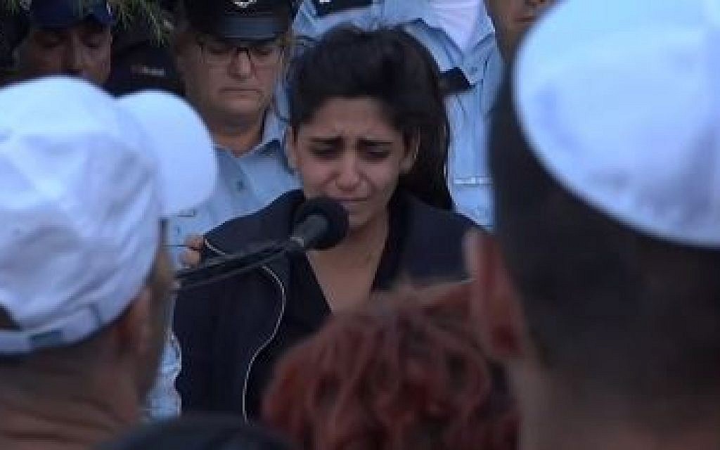Noy Kirma speaking at the funeral of her husband First Sergeant Yossef Kirma who was killed during a terrorist attack in Jerusalem, October 9, 2016 (Screen capture: Ynet)