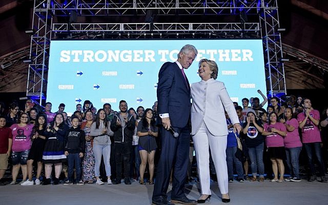 Former US president Bill Clinton and Democratic presidential nominee Hillary Clinton stand together while speaking to supporters at Craig Ranch Regional Park Amphitheater after the final presidential debate at the University of Nevada October 19, 2016 in North Las Vegas, Nevada. (AFP/Brendan Smialowski) Former US president Bill Clinton and Democratic presidential nominee Hillary Clinton stand together while speaking to supporters at Craig Ranch Regional Park Amphitheater after the final presidential debate at the University of Nevada October 19, 2016 in North Las Vegas, Nevada. (AFP/Brendan Smialowski)