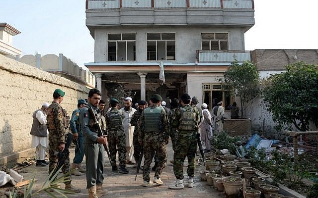 Afghan security forces inspect the site of a suicide bombing that targeted a gathering of the local tribal elders in Chaparhar district of Nangarhar province on October 31, 2016. ( AFP PHOTO / NOORULLAH SHIRZADA)