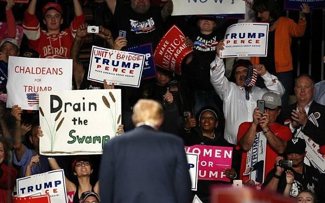 Supporters cheer after US Republican presidential candidate Donald Trump addressed a rally at Macomb Community College in Warren, Michigan, on October 31, 2016. (Jeff Kowalsky/AFP)