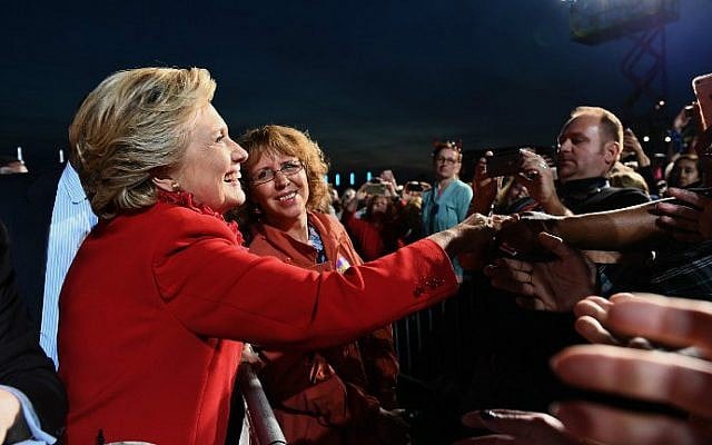 US Democratic presidential nominee Hillary Clinton greets supporters during a campaign rally in Cincinnati, Ohio on October 31, 2016. (Jewel Samad/AFP)