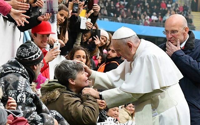 Pope Francis greets a handicapped wellwisher as he arrives at the Swedenbank Stadion in Malmo, Sweden, where he is to hold a mass on November 1, 2016. Francis is on a two-day visit to Sweden to mark the 500th anniversary of the Reformation. (AFP PHOTO / VINCENZO PINTO) Pope Francis greets a handicapped wellwisher as he arrives at the Swedenbank Stadion in Malmo, Sweden, where he is to hold a mass on November 1, 2016. Francis is on a two-day visit to Sweden to mark the 500th anniversary of the Reformation. (AFP PHOTO / VINCENZO PINTO)