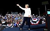 US Democratic presidential nominee Hillary Clinton waves to supporters during a campaign rally in Fort Lauderdale, Florida, on November 1, 2016.  (AFP/ Jewel SAMAD)