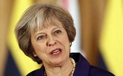 British Prime Minister Theresa May delivers a statement to the media at 10 Downing Street in London, November 2, 2016. (AFP/POOL/Kirsty Wigglesworth)