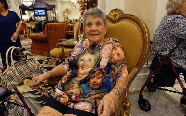 Rae Graham, 93, wears a Hillary Clinton shirt on early voting day at The Palace retirement home on November 1, 2016 in Coral Gables, Florida. (AFP/Kerry Sheridan) Rae Graham, 93, wears a Hillary Clinton shirt on early voting day at The Palace retirement home on November 1, 2016 in Coral Gables, Florida. (AFP/Kerry Sheridan)