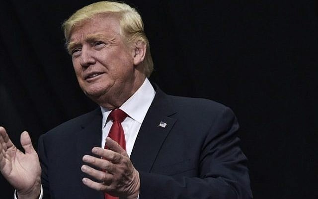 Republican presidential nominee Donald Trump arrives for a rally at the Giant Center in Hershey, Pennsylvania on November 4, 2016. (AFP PHOTO/MANDEL NGAN)