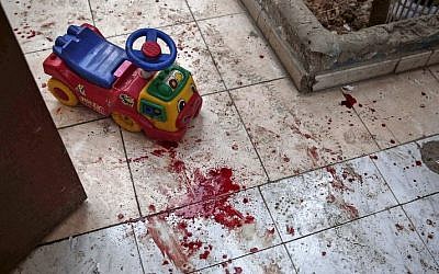 A picture shows the blood stained floor of a kindergarten following reported shelling in the rebel-held area of Harasta, on the northeastern outskirts of the capital Damascus, on November 6, 2016. (AFP PHOTO/Sameer Al-Doumy)