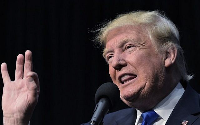 Republican presidential nominee Donald Trump speaks during a rally at the Sioux City Convention Center in Sioux City, Iowa on November 6, 2016.
(AFP PHOTO / MANDEL NGAN) Republican presidential nominee Donald Trump speaks during a rally at the Sioux City Convention Center in Sioux City, Iowa on November 6, 2016.
(AFP PHOTO / MANDEL NGAN)