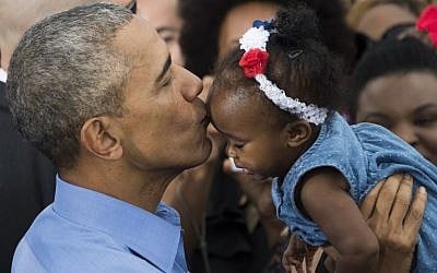 US President Barack Obama holds up a baby after speaking in Kissimmee, Florida as he campaigns for Democratic presidential nominee Hillary Clinton on November 6, 2016 (AFP PHOTO/JIM WATSON) US President Barack Obama holds up a baby after speaking in Kissimmee, Florida as he campaigns for Democratic presidential nominee Hillary Clinton on November 6, 2016 (AFP PHOTO/JIM WATSON)