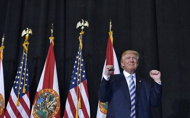 Republican presidential nominee Donald Trump arrives for a rally in the Robarts Arena of the Sarasota Fairgrounds on November 7, 2016 in Sarasota, Florida. (AFP / MANDEL NGAN)