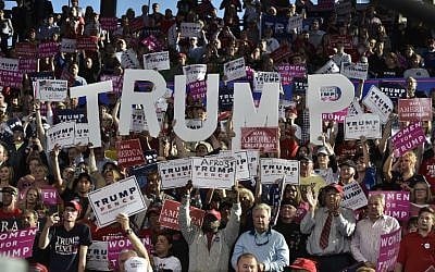 Supporters cheer at a rally for Republican presidential nominee Donald Trump at the J.S. Dorton Arena in Raleigh, North Carolina on November 7, 2016. (AFP PHOTO / MANDEL NGAN)