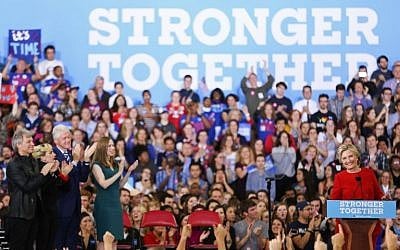 Hillary Clinton addresses the crowd of supporters inside the Reynolds Coliseum on the campus of North Carolina State University on the final campaign stop before election day, in Raleigh, North Carolina, on November 7, 2016. (AFP PHOTO / Logan Cyrus)