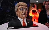 A cake in the likeness of Republican presidential nominee Donald Trump is on display at his election night event at the New York Hilton Midtown in New York on November 8, 2016.  (AFP/ Timothy A. CLARY)