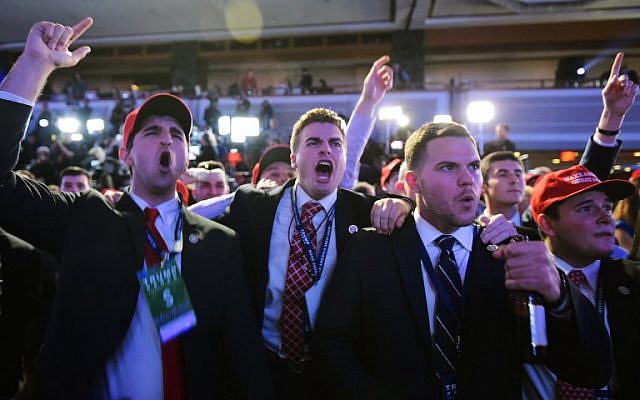 Supporters of Republican presidential nominee Donald Trump reacts to early results during election night at the New York Hilton Midtown in New York on November 8, 2016. (AFP PHOTO / Mandel NGAN) Supporters of Republican presidential nominee Donald Trump reacts to early results during election night at the New York Hilton Midtown in New York on November 8, 2016. (AFP PHOTO / Mandel NGAN)