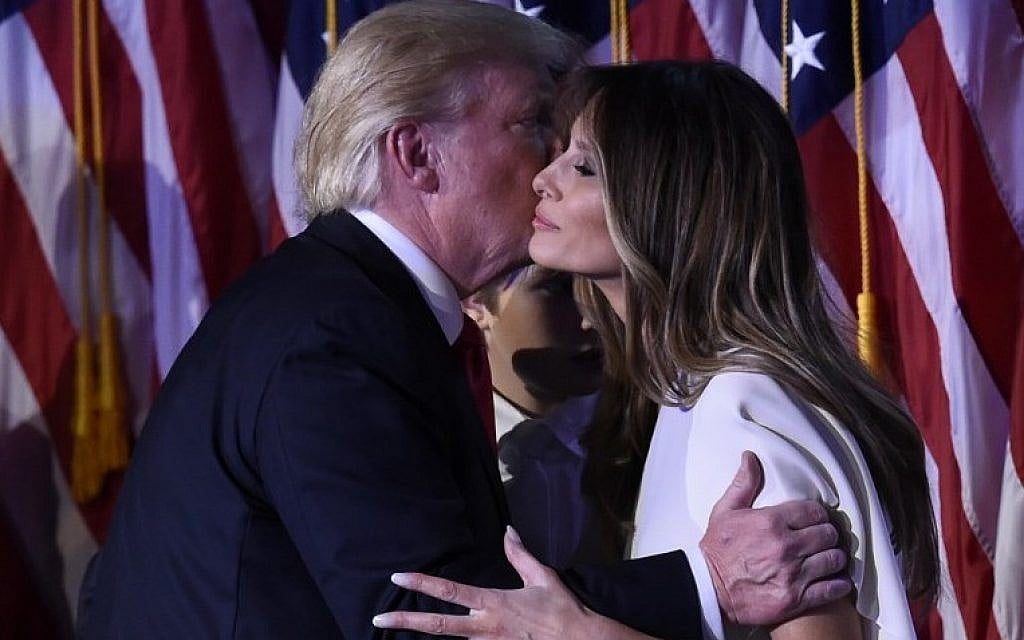 US president-elect Donald Trump greets wife Melania after speaking at the New York Hilton Midtown in New York on November 8, 2016. (AFP PHOTO/SAUL LOEB) US president-elect Donald Trump greets wife Melania after speaking at the New York Hilton Midtown in New York on November 8, 2016. (AFP PHOTO/SAUL LOEB)