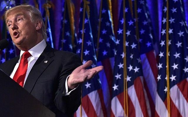 Republican presidential elect Donald Trump gives a speech during election night at the New York Hilton Midtown in New York on November 9, 2016.
Trump stunned America and the world Wednesday, riding a wave of populist resentment to defeat Hillary Clinton in the race to become the 45th president of the United States. / AFP PHOTO / MANDEL NGAN Republican presidential elect Donald Trump gives a speech during election night at the New York Hilton Midtown in New York on November 9, 2016.
Trump stunned America and the world Wednesday, riding a wave of populist resentment to defeat Hillary Clinton in the race to become the 45th president of the United States. / AFP PHOTO / MANDEL NGAN