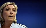President of the French far-right party and presidential candidate for the 2017 French Presidential elections Marine Le Pen delivers a speech during a press conference on november 9, 2016 in the party headquarters in Nanterre, near Paris, following the victory by US Republican candidate Donald Trump in US presidential elections. (AFP / Martin BUREAU)