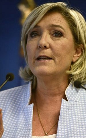 President of the French far-right party and presidential candidate for the 2017 French Presidential elections Marine Le Pen delivers a speech during a press conference on november 9, 2016 in the party headquarters inNanterre, near Paris, following the victory by US Republican candidate Donald Trump in US presidential elections.(AFP PHOTO / Martin BUREAU) President of the French far-right party and presidential candidate for the 2017 French Presidential elections Marine Le Pen delivers a speech during a press conference on november 9, 2016 in the party headquarters inNanterre, near Paris, following the victory by US Republican candidate Donald Trump in US presidential elections.(AFP PHOTO / Martin BUREAU)
