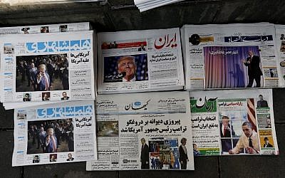 Local newspapers displaying articles on US president-elect Donald Trump a day after his election, Tehran, Iran, November 10, 2016. (AFP/ATTA KENARE)