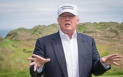Then-presumptive Republican presidential nominee Donald Trump on June 25, 2016, speaking to members of the media during a tour of his International Golf Links course in Balmedie, north of Aberdeen, on the east coast of Scotland. (AFP/ Michal Wachucik)