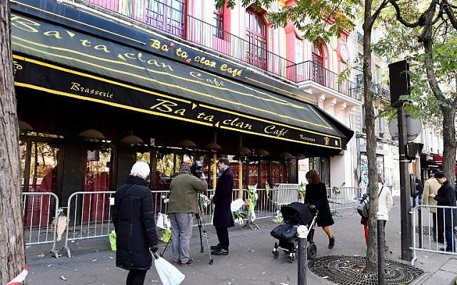 People walk in front of the Bataclan concert hall in Paris on November 11, 2016. (AFP/Miguel Medina) People walk in front of the Bataclan concert hall in Paris on November 11, 2016. (AFP/Miguel Medina)