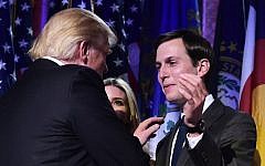 Donald Trump shakes hands with son-in-law Jared Kushner during an election night party at a hotel in New York on November 9, 2016. (AFP / MANDEL NGAN)