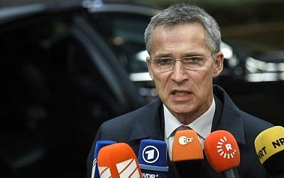 NATO Secretary-General Jens Stoltenberg answers journalists' questions during a Defence Council meeting at the EU headquarters in Brussels on November 15, 2016. (AFP PHOTO / JOHN THYS)