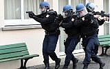 Illustrative: French gendarmes take part in a simulation of a terror attack during a training exercise of the Civil Security to test the reactivity of rescue teams at Sainte-Therese middle school in Beaumont-sur-Sarthe, northwestern France, on November 15, 2016. (AFP Photo/Jean-Francois Monier)